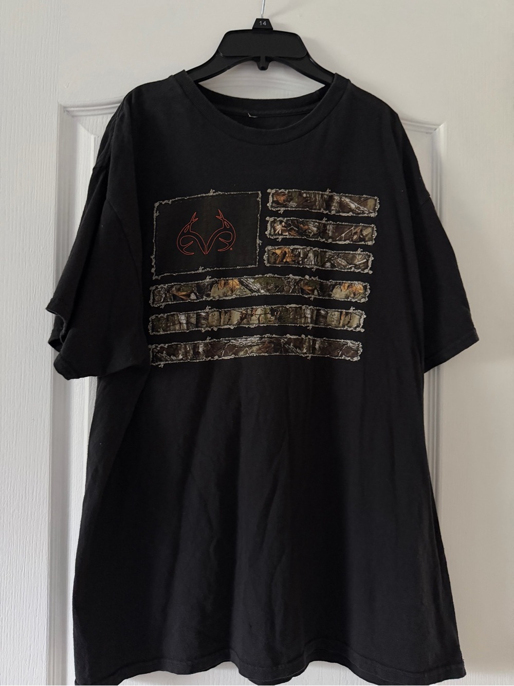 Black Realtree Men’s T-Shirt with Camo Flag Print